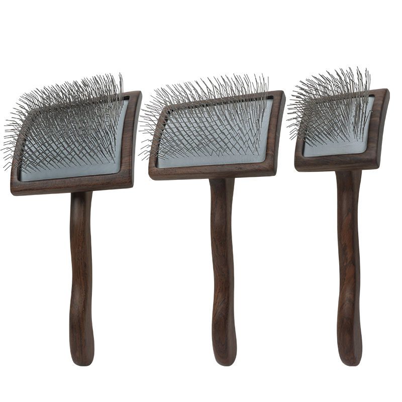 Wooden handle dog grooming brush with stainless steel pins, designed for effective pet hair removal and coat maintenance
