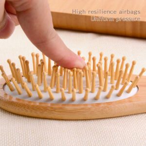 Bamboo scalp massage comb with air cushion and flexible airbag base for daily hair care.