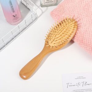 Scalp massage comb with beech wood handle and cushioned pins, designed for gentle detangling and daily hair care