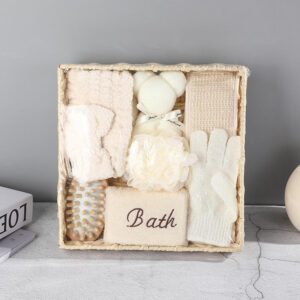 Shower gift set displayed in a woven basket with body care gift set items including bath sponge, gloves, brush, towel, and massage accessories.
