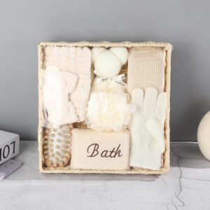 Shower gift set displayed in a woven basket with body care gift set items including bath sponge, gloves, brush, towel, and massage accessories.