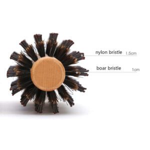 Small round hairbrush with wooden handle and mixed bristles, a wooden hairbrush designed as a round hair brush for styling.