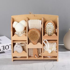 Spa gift set arranged in a wooden organizer with bath accessories, brushes, sponge, pumice stone, and body care tools.
