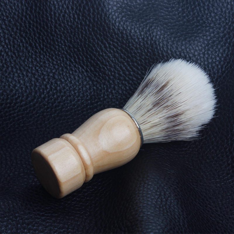 JEYGO wooden shaving brush with soft bristles, designed for smooth facial shaving and rich foam creation.