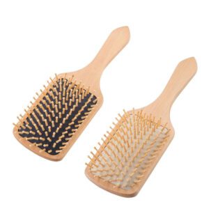 Wood comb with smooth wooden bristles designed as a scalp massage comb for comfortable daily hair care.