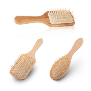 Wood comb with smooth wooden bristles designed as a scalp massage comb for comfortable daily hair care.