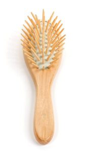 Wooden comb for hair with smooth wooden pins, designed as a lightweight wooden comb brush for gentle scalp care.