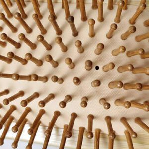 Wooden hair brush with bamboo bristle brush design, suitable for dry hair care and daily scalp massage.