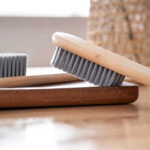 JEYGO wooden laundry brush with sturdy plastic bristles, suitable for clothes and shoe cleaning.