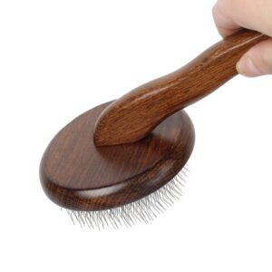 Round dog hair comb with wooden handle and stainless steel pins, suitable for grooming and removing loose hair from dogs and cats