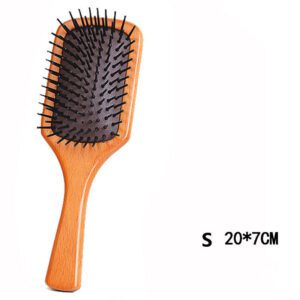 Wooden comb with rubber cushion base, designed as a comb massager for daily hair brushing.