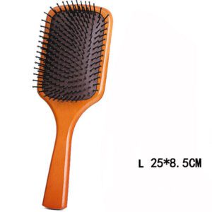 Wooden comb with rubber cushion base, designed as a comb massager for daily hair brushing.