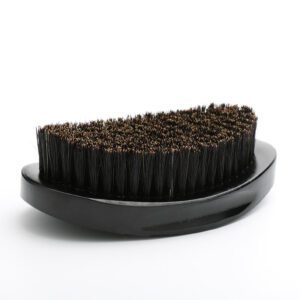 JEYGO wooden boar bristle brush designed for men’s shaving and daily beard grooming, featuring a smooth black wooden base.