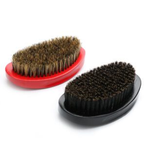 JEYGO wooden boar bristle brush designed for men’s shaving and daily beard grooming, featuring a smooth black wooden base.