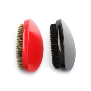 JEYGO wooden boar bristle brush designed for men’s shaving and daily beard grooming, featuring a smooth black wooden base.