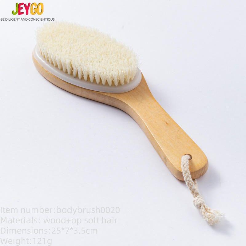 A natural wood brush with soft bristles, designed for gentle exfoliation and improving skin health.