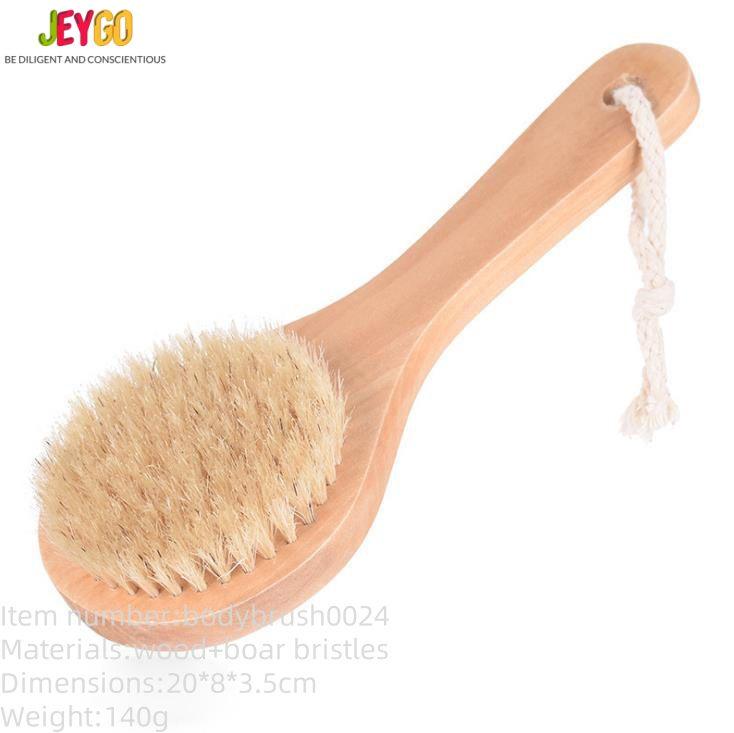 A wooden shower back brush with natural boar bristles, designed for dry brushing before or after your shower.