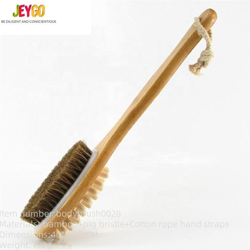 A bamboo brush with natural bristles and a long handle, ideal for exfoliating and improving skin health.