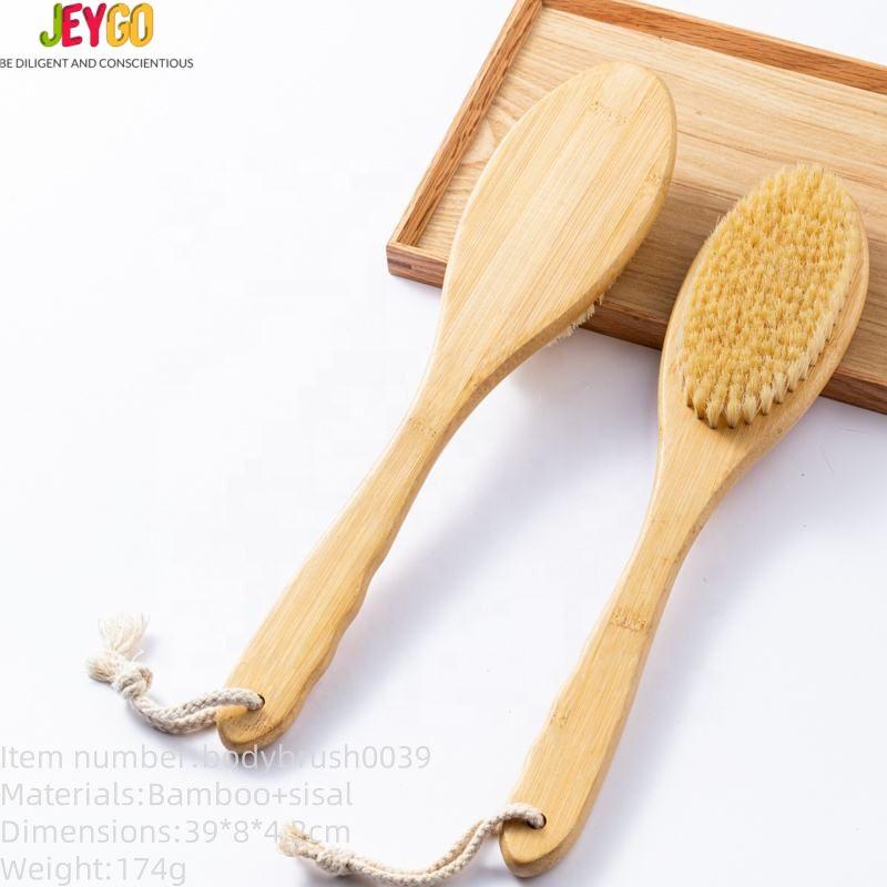 Skin care brush with bamboo handle and sisal bristles, designed for gentle exfoliation and healthy skin care routines.