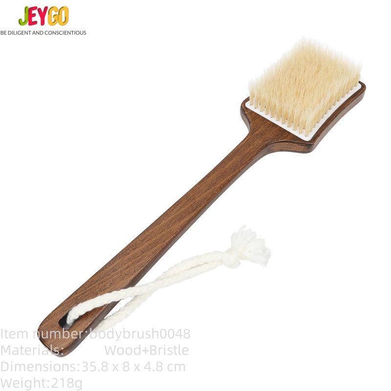 Bath brush with long handle made of dark wood and natural bristles, designed for dry body brushing and exfoliation.