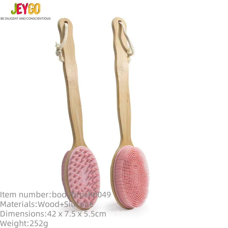 Double-sided shower brush with a long bamboo handle and soft silicone bristles for cleansing and massage.