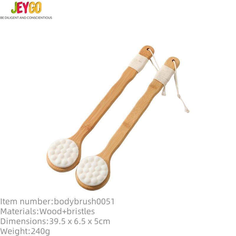 Shower back scrubber with a long wooden handle and soft cleansing pad, designed for bathing and body care.