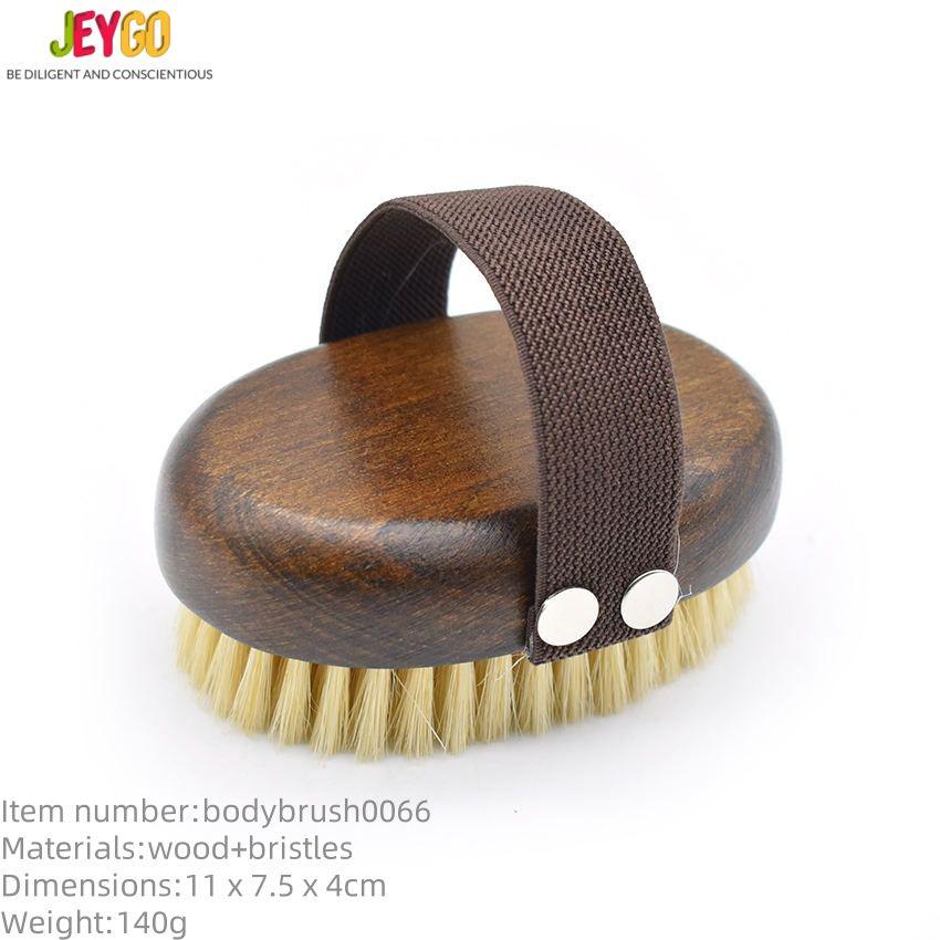 Wooden massage brush with boar bristle and hand strap, suitable for wet and dry use as a shower brush.
