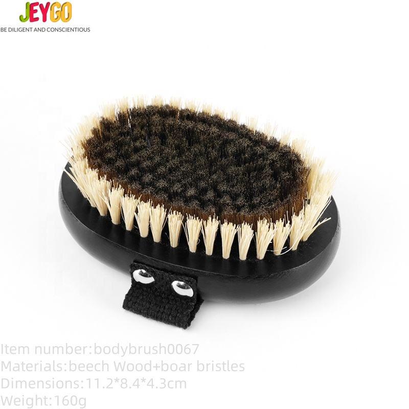 Body dry brush with soft to medium boar bristles, designed for massage and gentle exfoliation.
