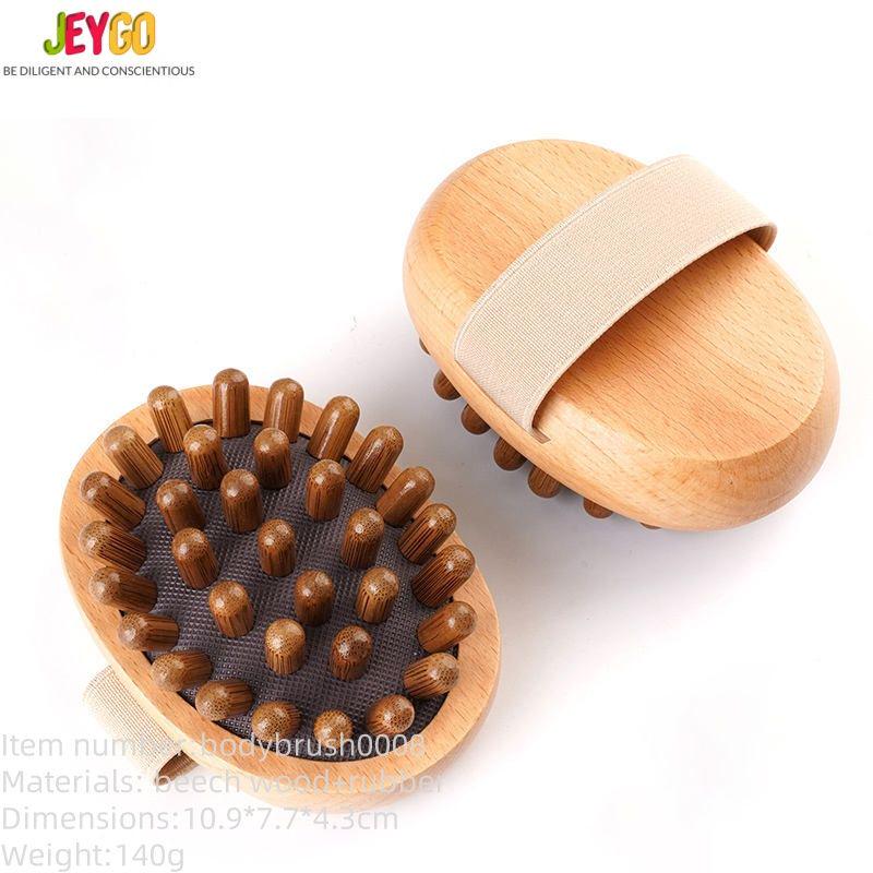Oval-shaped wooden bath and scalp massage brush with elastic hand strap and multiple rounded massage nodes, produced by a China-based bath brush manufacturer.