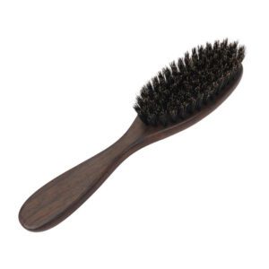 Pet cleaning brush with dense bristles and wooden handle, designed for removing loose cat hair and maintaining a clean coat
