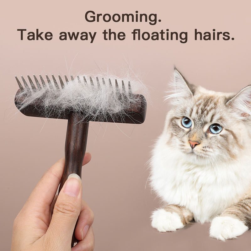 Ebony wood pet grooming brush with stainless steel pins for removing pet hair and grooming pets effectively.