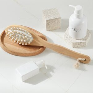 Long-handled shower brush made of natural wood with a soft natural bristle dry brush surface and massage nodes for removing dead skin.