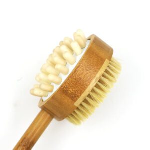 Boar bristle shower brush with a long wooden handle and dual-sided design for exfoliating and massaging during bath routines.
