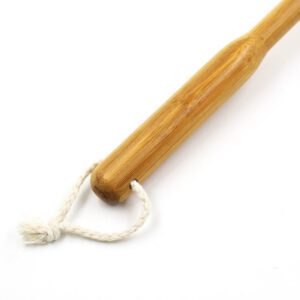 Boar bristle shower brush with a long wooden handle and dual-sided design for exfoliating and massaging during bath routines.