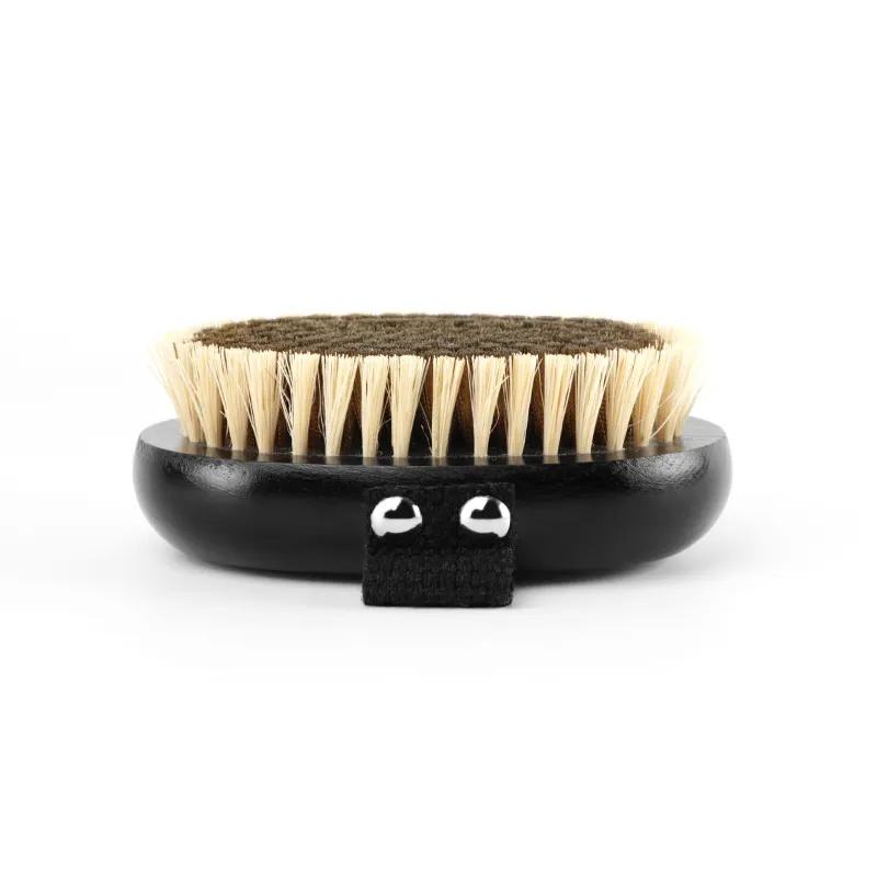 Body dry brush with soft to medium boar bristles, designed for massage and gentle exfoliation.
