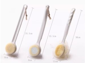 Plastic body massage brush with soft bristles, perfect for gentle exfoliation and dry brushing for sensitive skin.