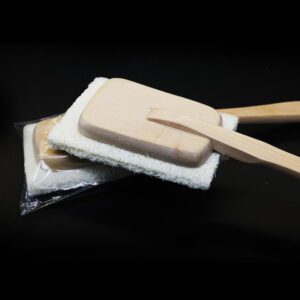 Detachable bath towel with natural loofah sponge head and wooden handle, designed as a body scrub brush.