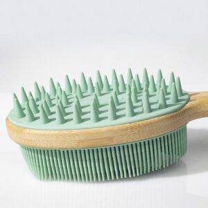 Double-sided shower brush with a long bamboo handle and soft silicone bristles for cleansing and massage.