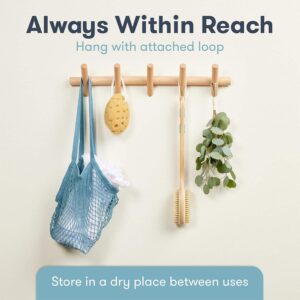 Shower brush with long handle made of wood and natural bristles, suitable for back and body cleansing.