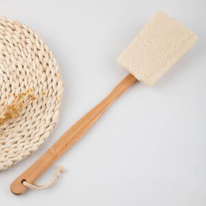 Exfoliating loofah sponge with long wooden handle, designed as a spa back scrubber for body cleansing.