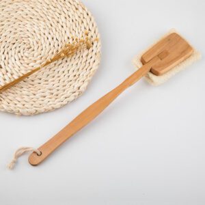 Exfoliating loofah sponge with long wooden handle, designed as a spa back scrubber for body cleansing.