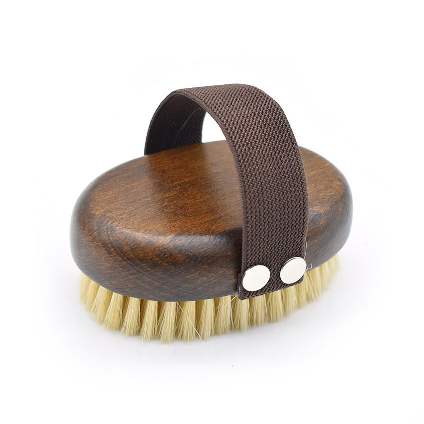 Wooden massage brush with boar bristle and hand strap, suitable for wet and dry use as a shower brush.