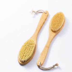 Natural scrub brush made with bamboo and sisal bristles, designed for gentle exfoliation and daily bathing.