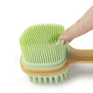 Silicone bath brush with a long bamboo handle, featuring durable silicone bristles ideal for exfoliating and back scrubbing.