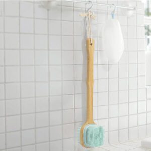 Silicone bath brush with a long bamboo handle, featuring durable silicone bristles ideal for exfoliating and back scrubbing.