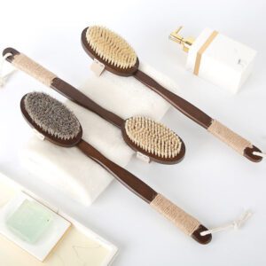 Soft bristle bath brush with a bamboo handle, featuring natural boar bristles and horsehair/sisal fibers for gentle exfoliation.