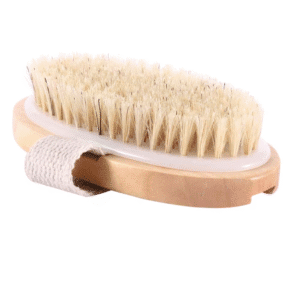 Long handle brush for bathing with natural wood handle and soft bristles, designed for full-body exfoliation.