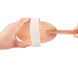 Long handle brush for bathing with natural wood handle and soft bristles, designed for full-body exfoliation.