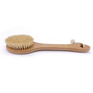 Natural bristle scrub brush with a long wooden handle, featuring soft boar bristles for gentle exfoliation during bathing.