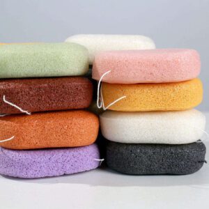 Konjac body sponge in multiple colors for gentle exfoliation and daily body cleansing